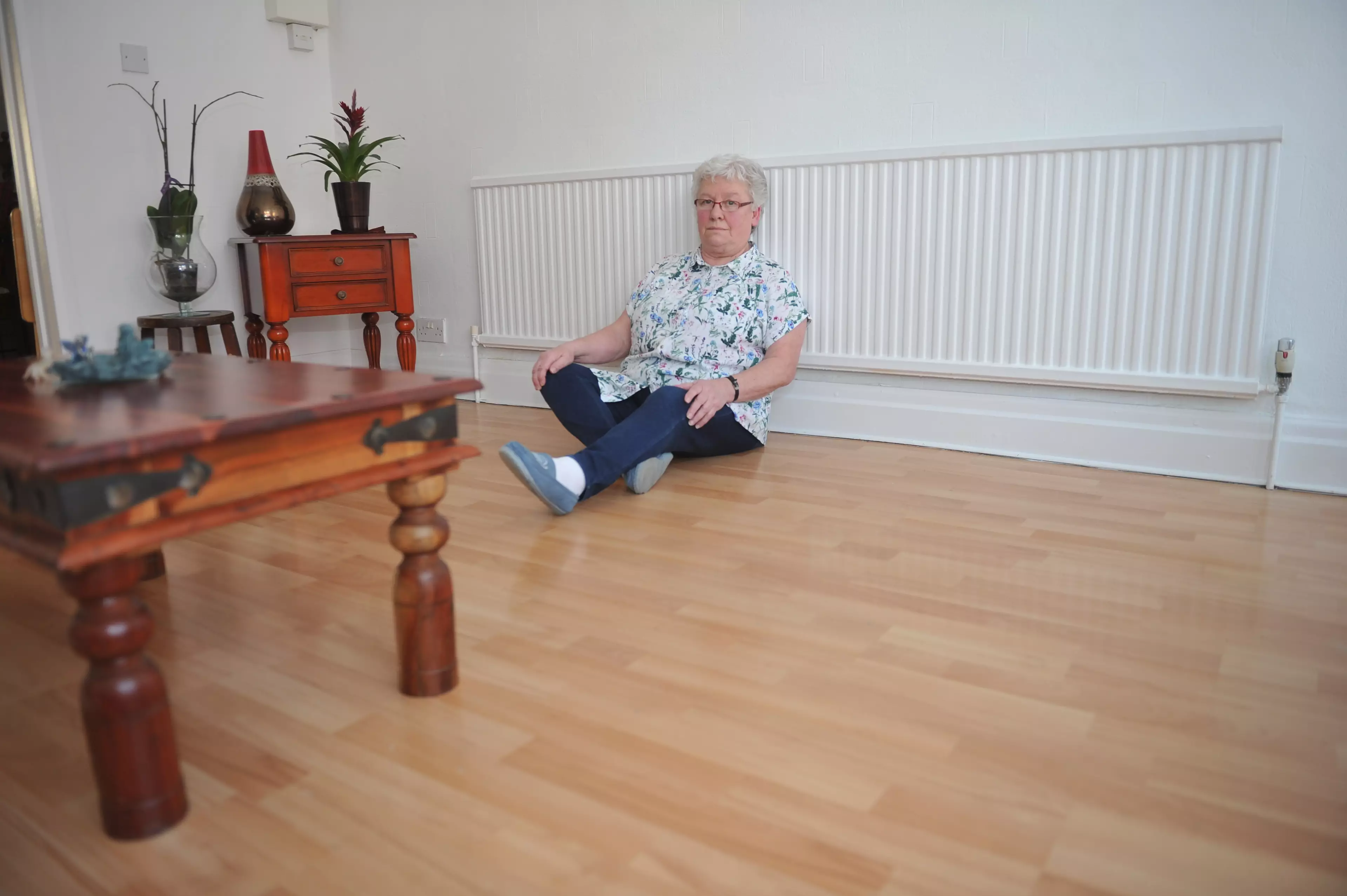 Gillian Griffin says she's left with back pain after having to sit on a wooden dining chair.