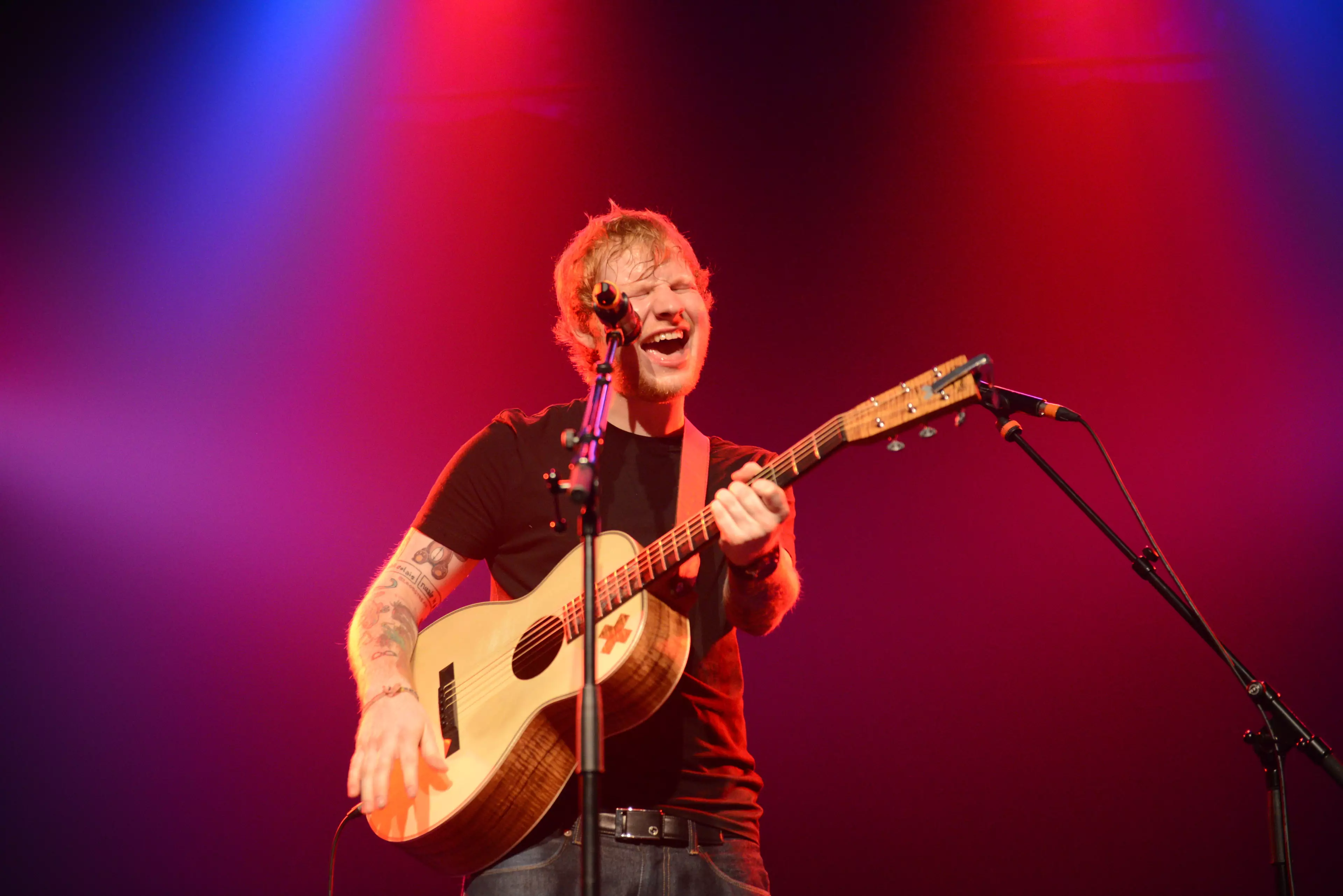 Ed Sheeran performs on stage during his concert in Cologne, Germany in 2014.