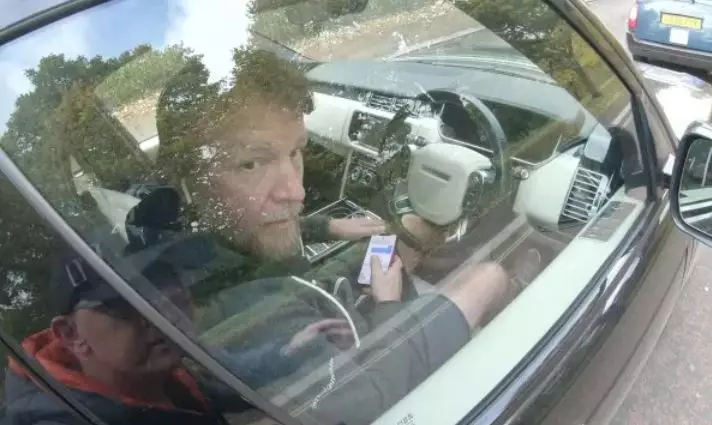 The director was caught using his phone while driving through London last year.