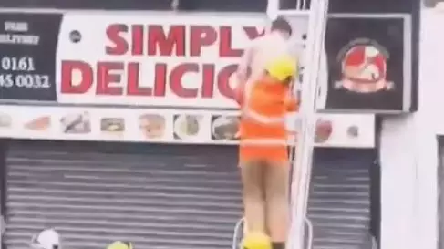 Fire Service Rescue Naked Man From Massage Parlour Window Ledge
