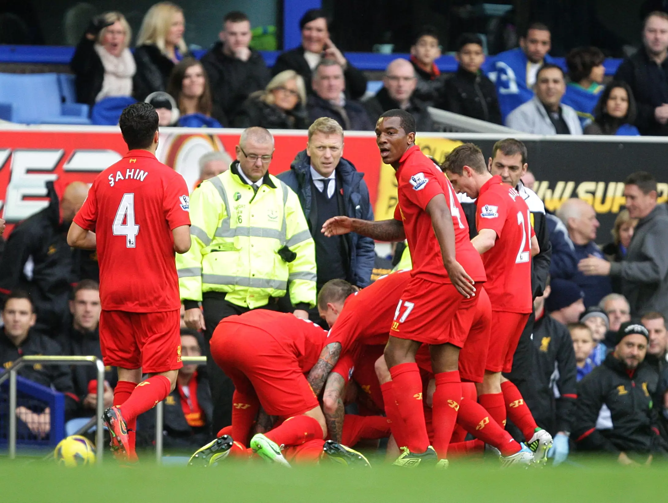 Luis Suarez takes a dive at David Moyes after scoring in the Merseyside derby
