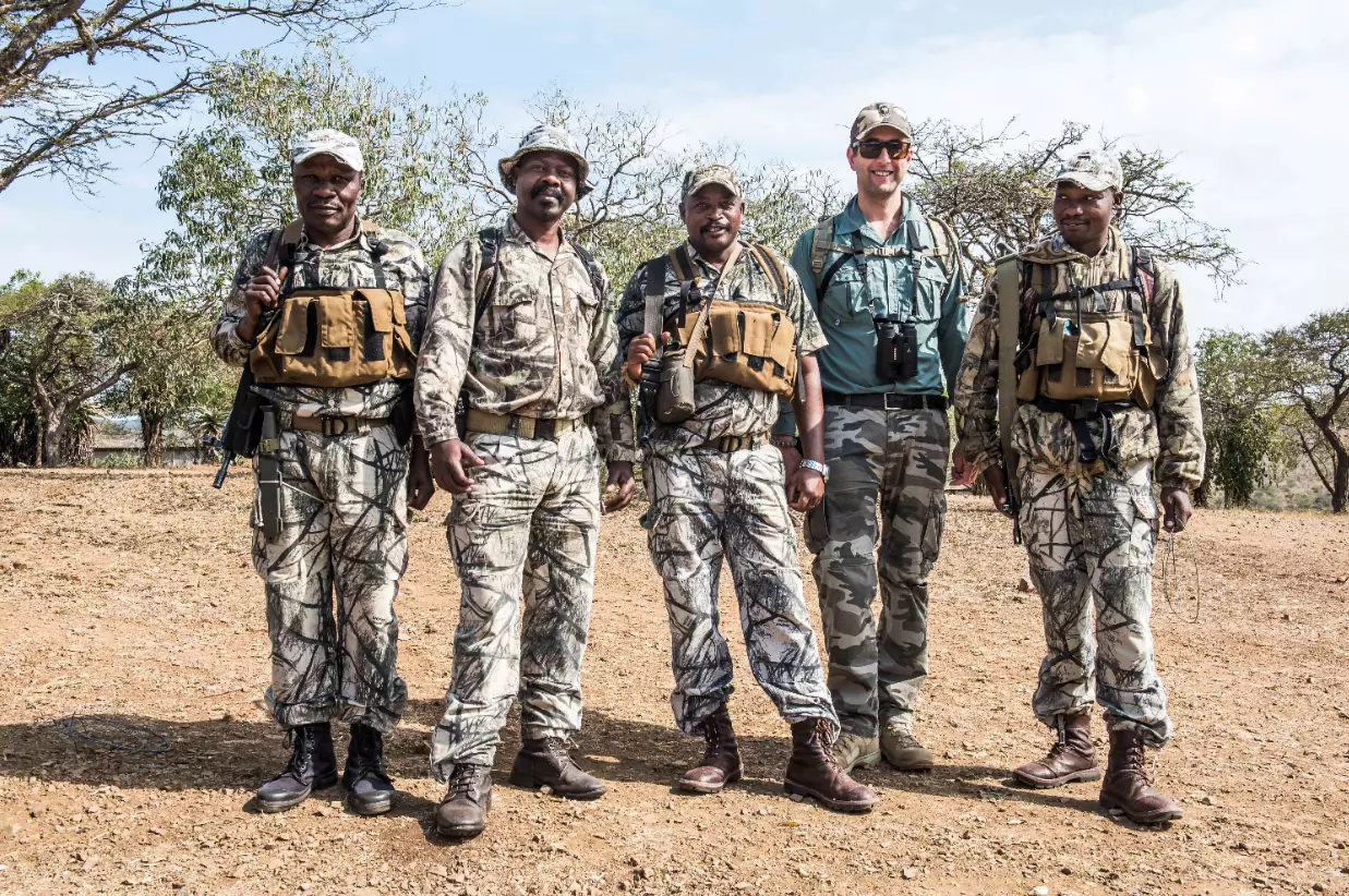 Andrew Campbell (second from right) with a group of field rangers.