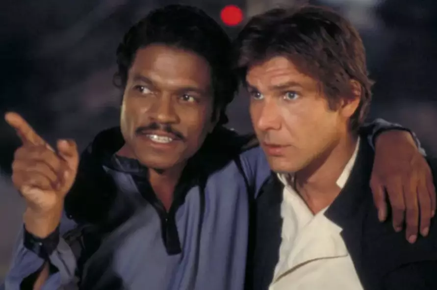 Billy Dee Williams as Lando alongside co-star Harrison Ford.