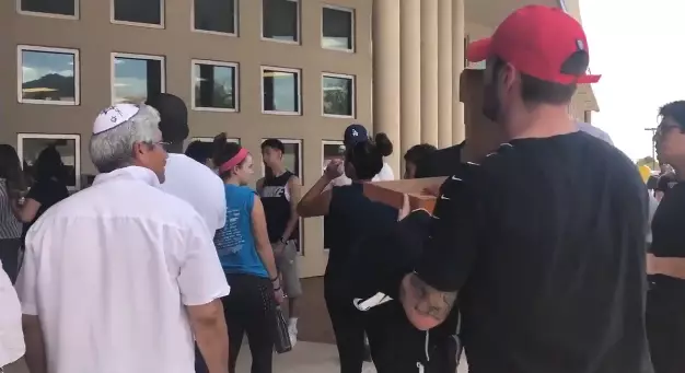 A man handed out free pizza to people waiting to donate blood in El Paso, Texas.