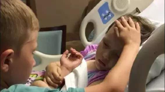 Heart-Broken Parents Share Photo Of Their Son Comforting His Sister Hours Before She Died 