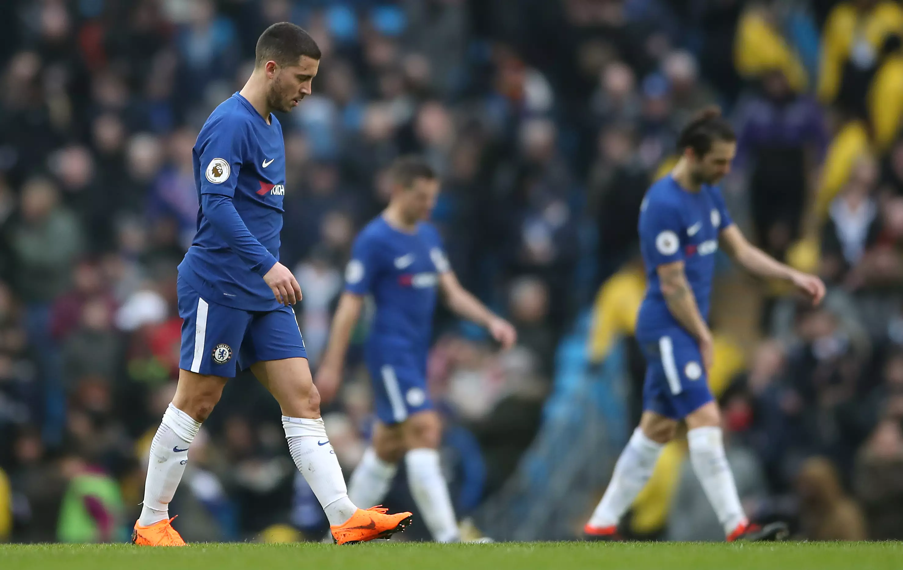 Chelsea players cut a dejected figure. Image: PA