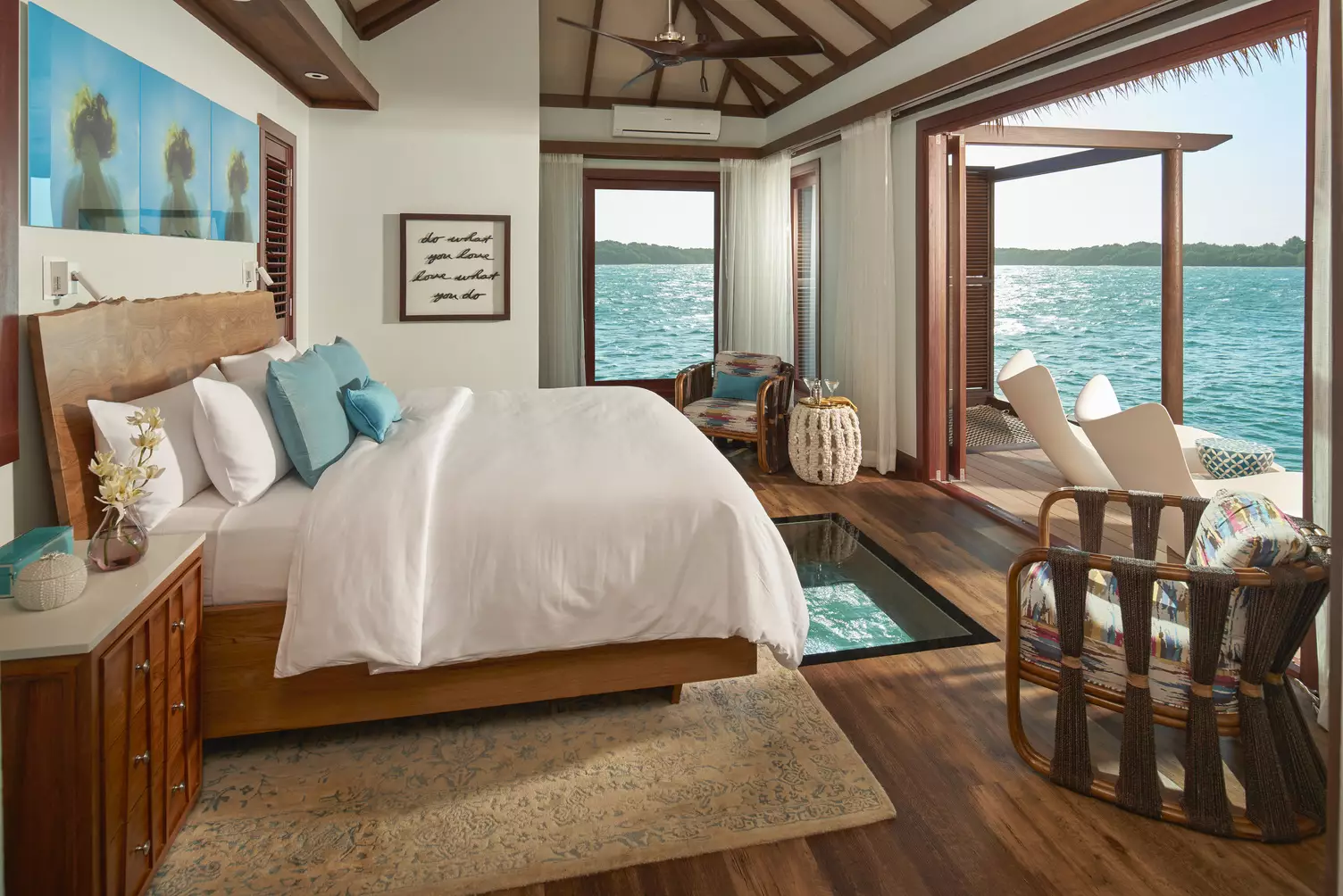 There's a glass panel on the floor of your bedroom where you can spy down on marine life (