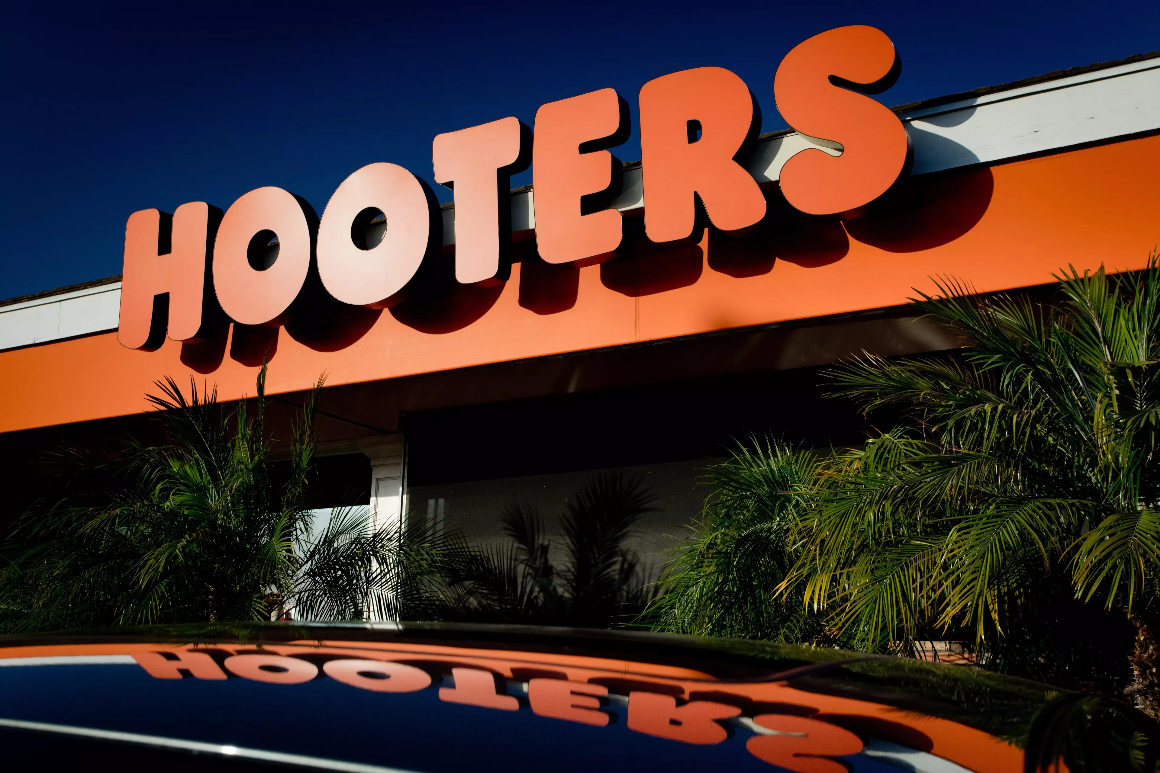A high school football coach has come under fire for taking his team to Hooters.