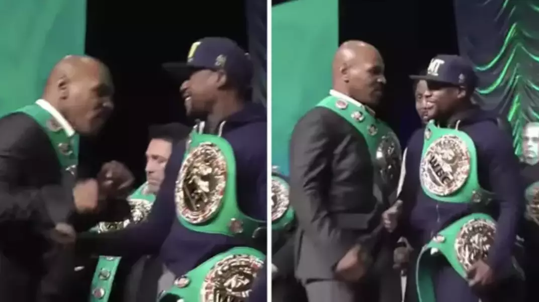 Mike Tyson Aggresively Swings At Floyd Mayweather And He Doesn't Even Flinch