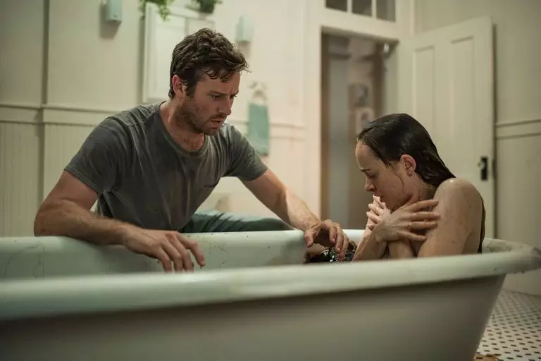 Armie Hammer and Dakota Johnson in Wounds.