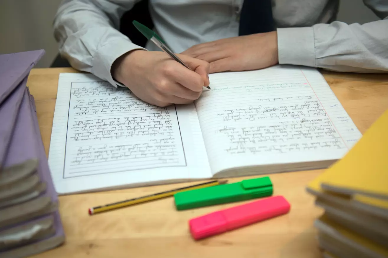 A pupil completing homework.