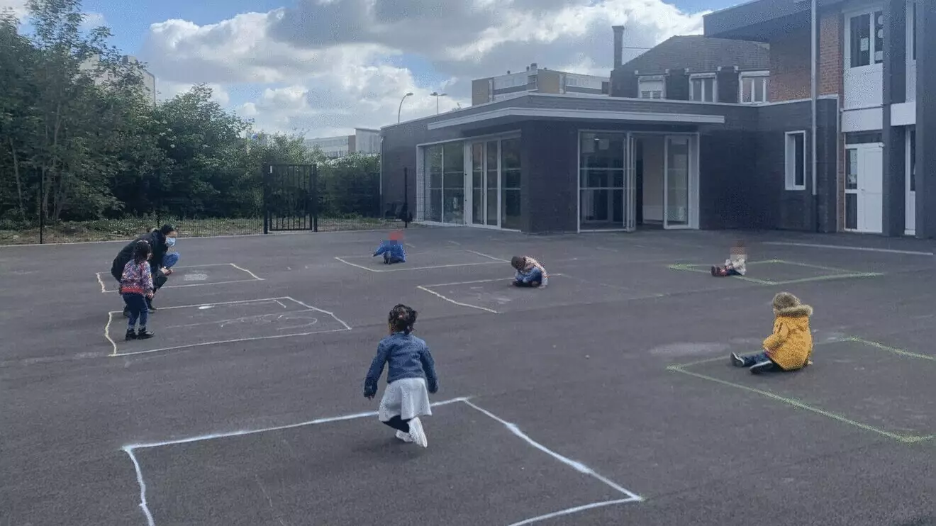 Photos Show Kids In France Returning To School And Sitting In Chalk Squares