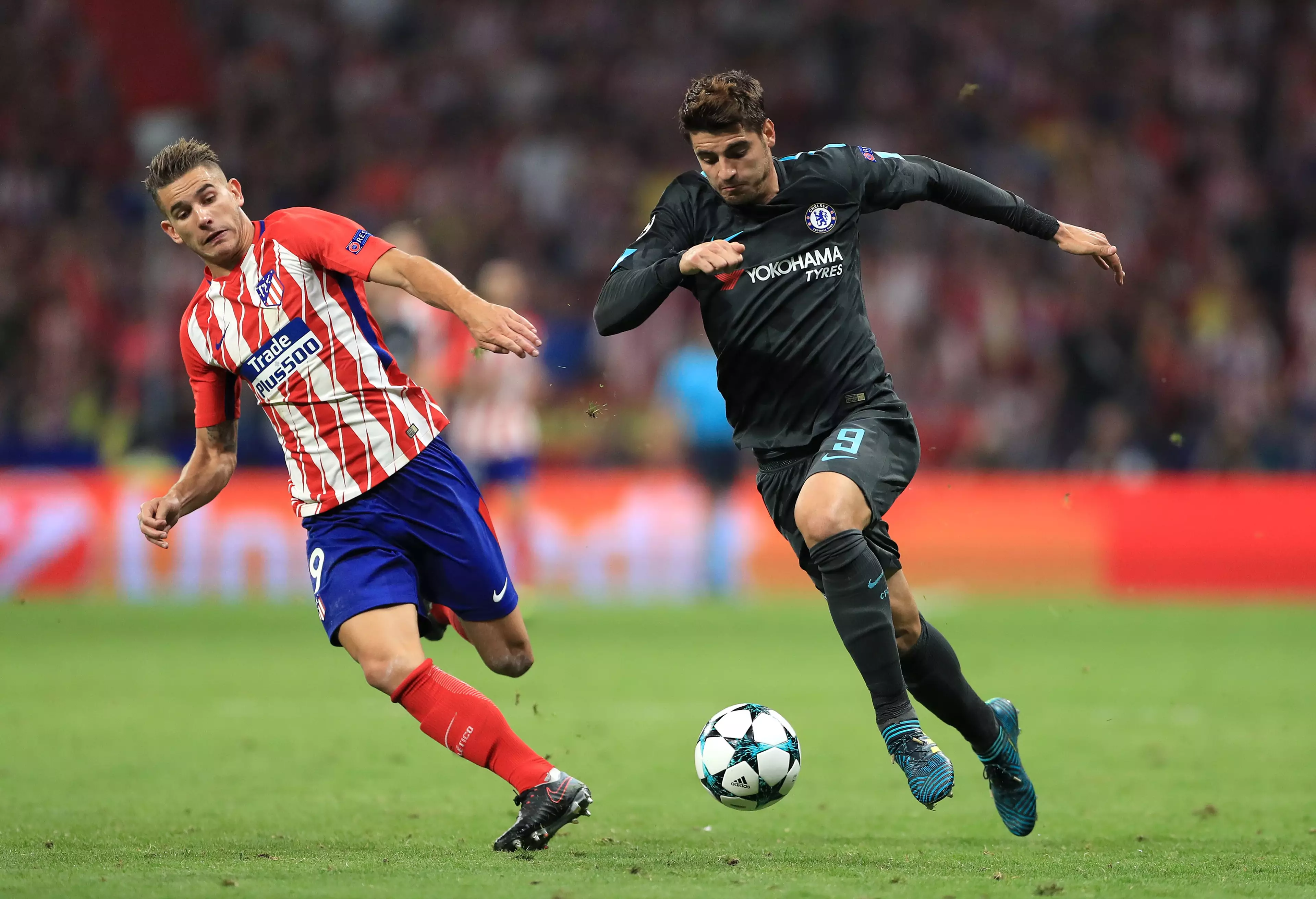Hernandez chasing down Morata in the Champions League. Image: PA