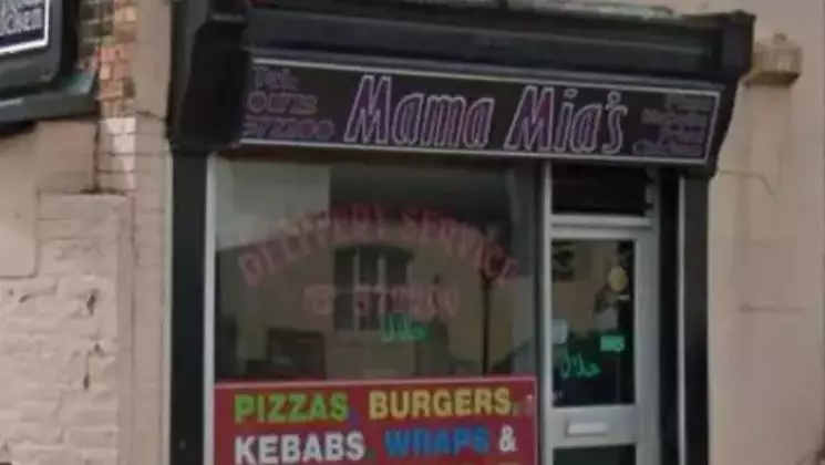 A takeaway was forced to take down its 'anti-mask' sign.