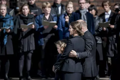 Anders Holch Povlsen and wife Anne, attend the funeral service for their three children at Aarhus Cathedral, Denmark, Saturday May 4.