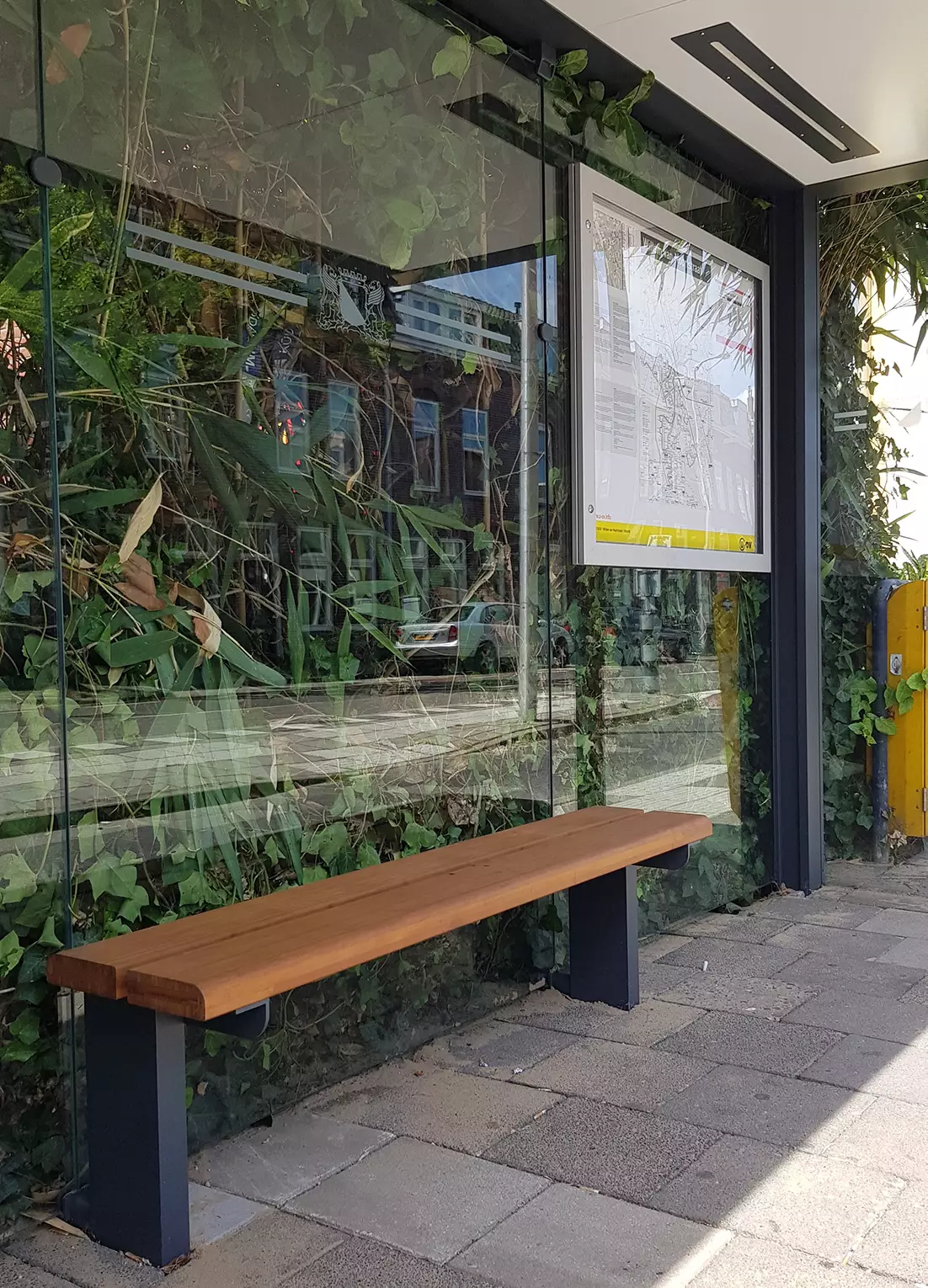 The bus shelters have bamboo benches and solar-powered lighting