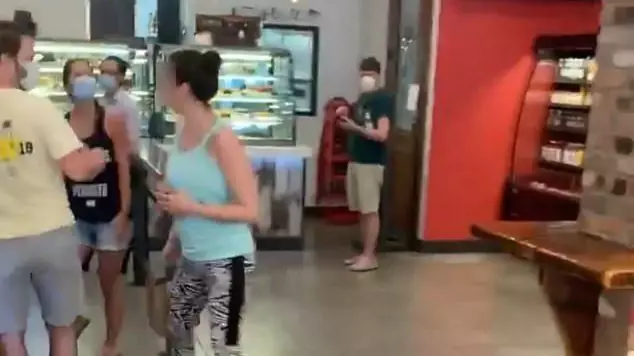 Bagel Shop Customer Coughs On Woman Who Calls Her Out For Not Wearing A Mask