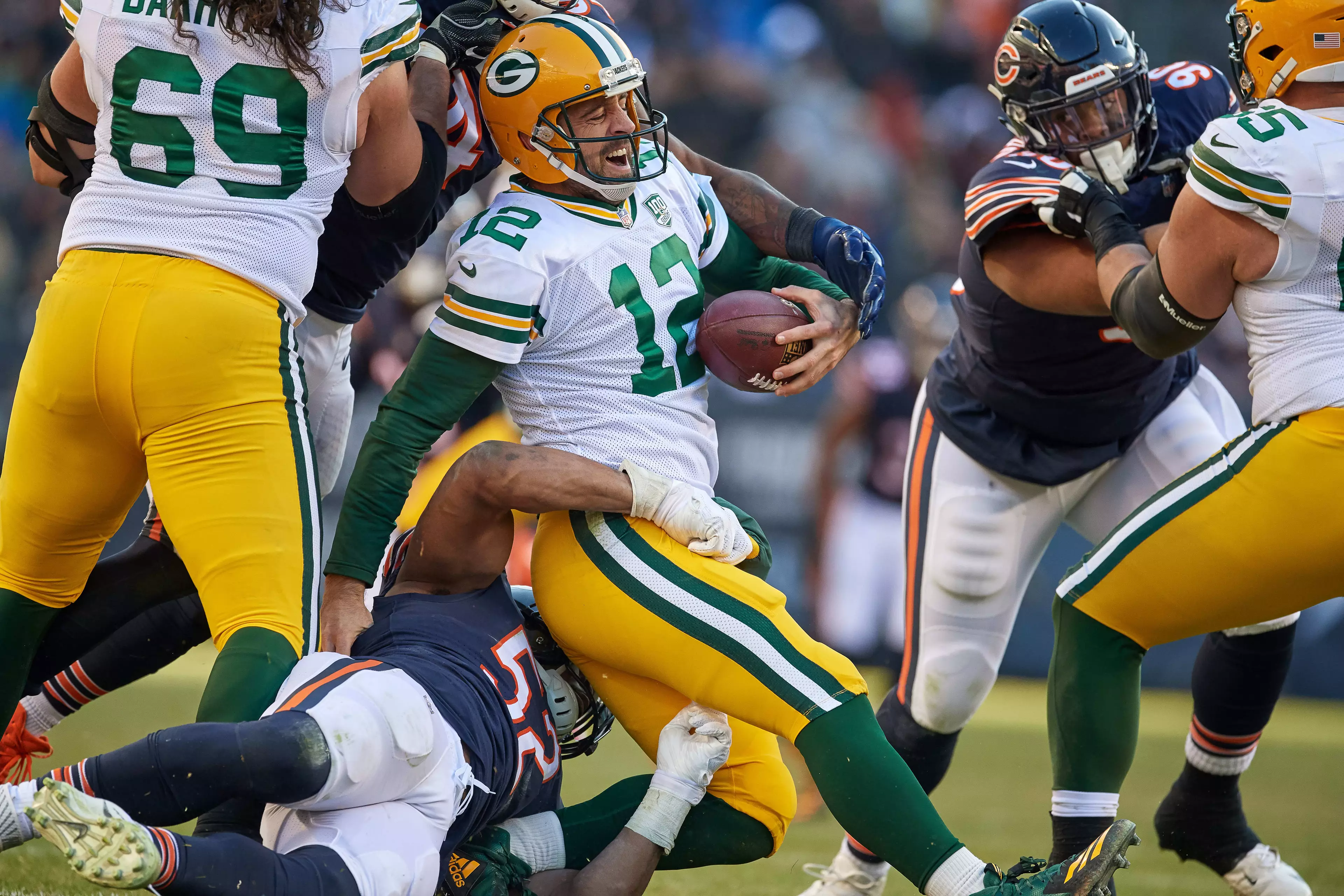 Khalil Mack (52) sacks Aaron Rodgers during Chicago's clash with Green Bay in December
