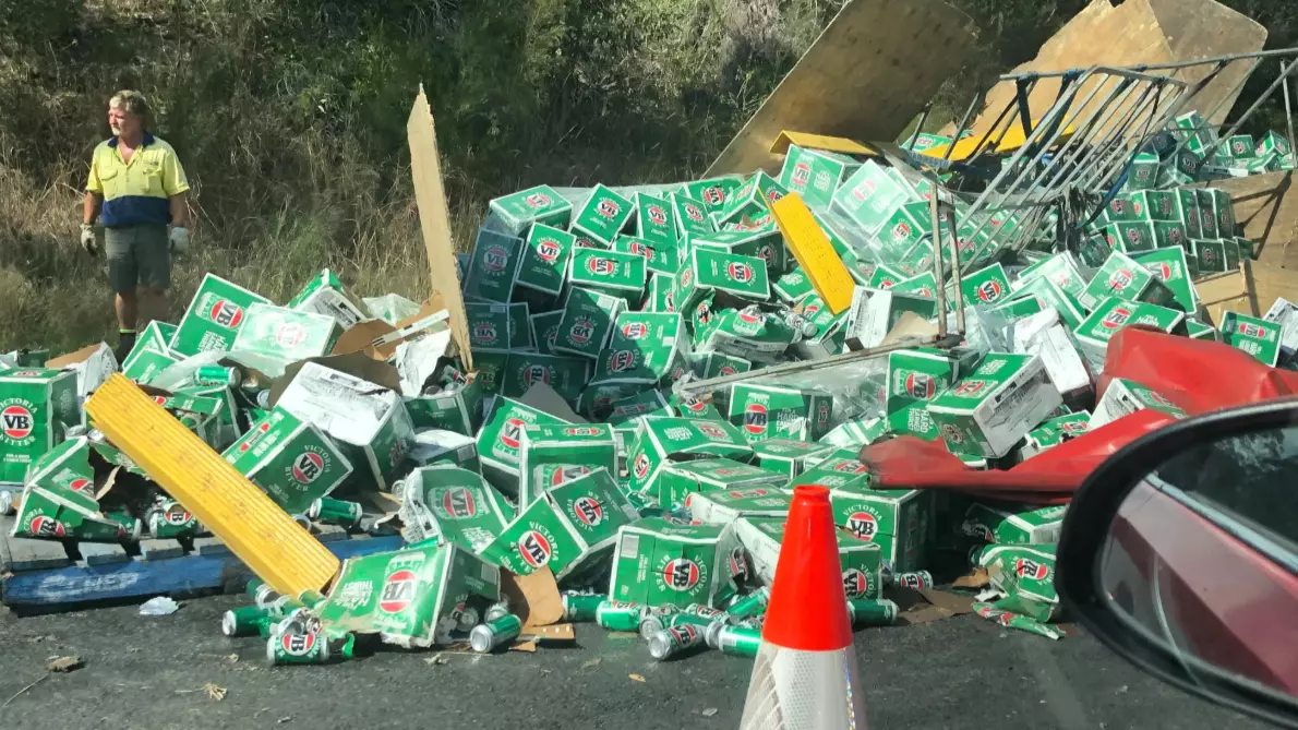 Hundreds Of VB Cans Strewn Across Highway After Truck Crash