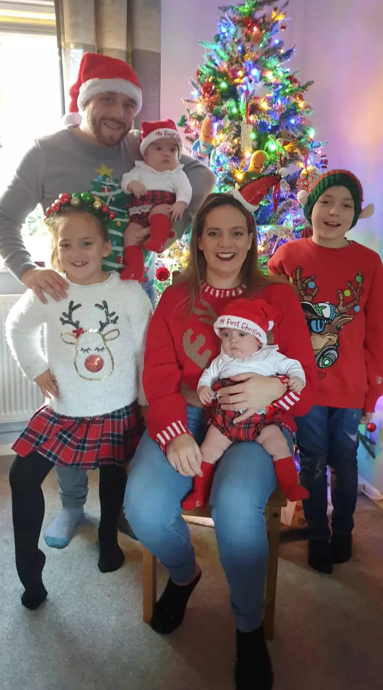 Sarah Curtis with her husband Aaron, her son Roick, nine, daughter Marcey, seven and the twins Kenna and Lissa (