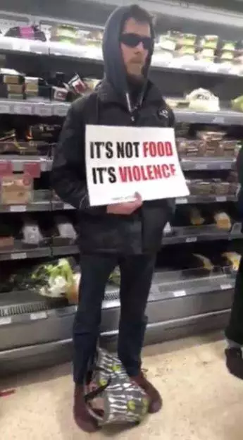 One protester held a sign reading 'it's not good it's violence'.