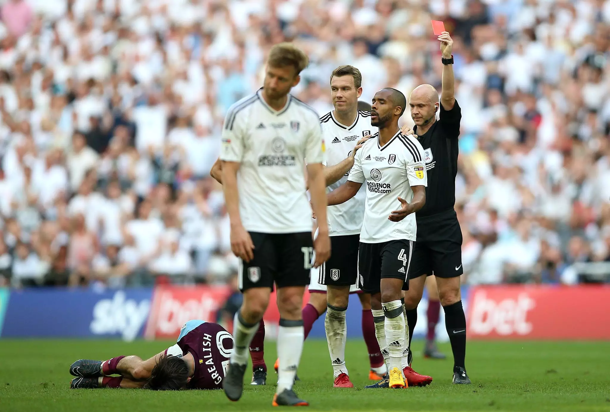 Odoi sees red after bringing down Grealish. Image: PA Images