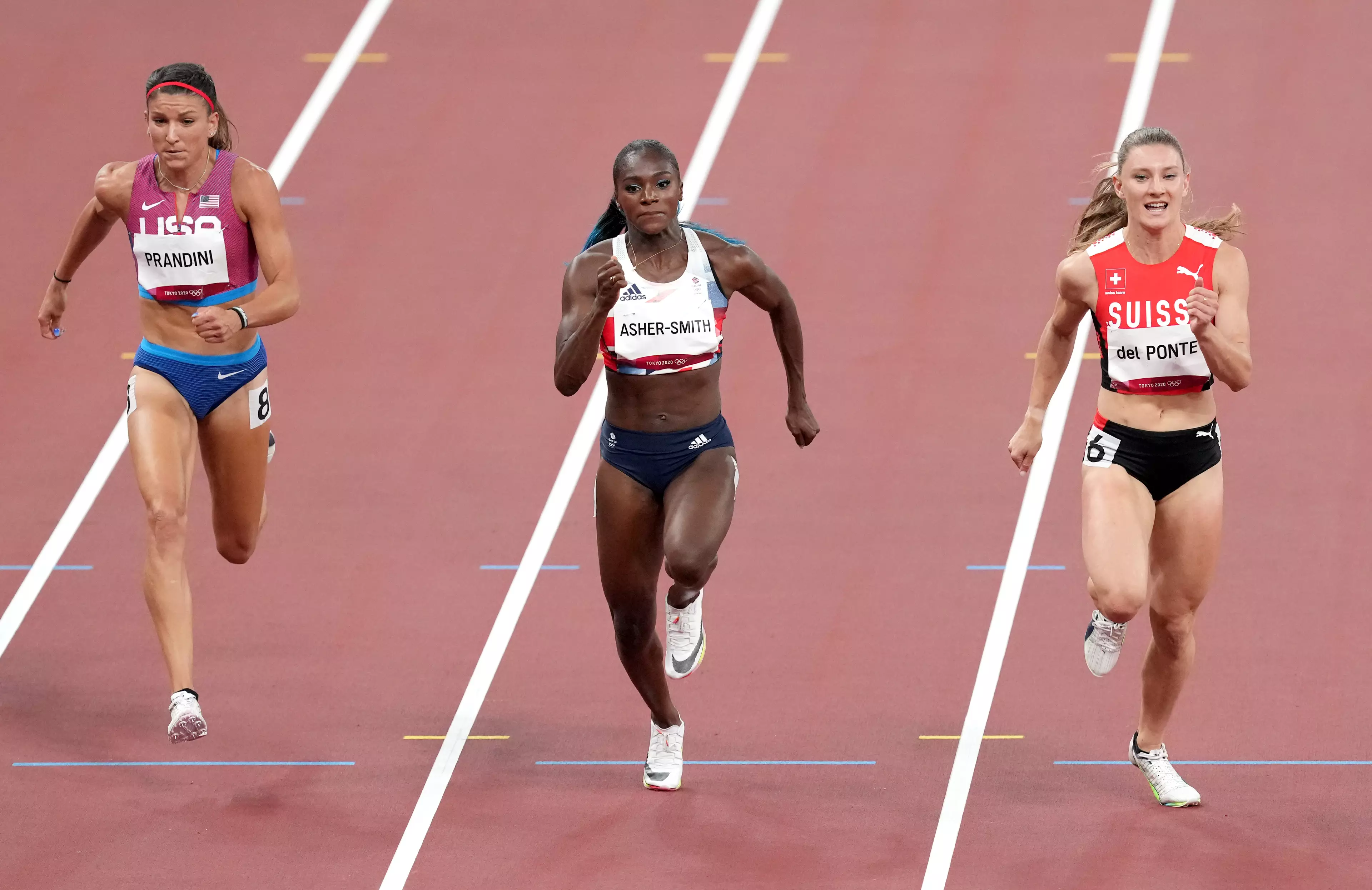 Dina Asher-Smith competing in the Women's 100m at Tokyo. (