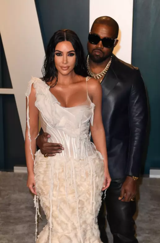 Kanye with wife Kim.