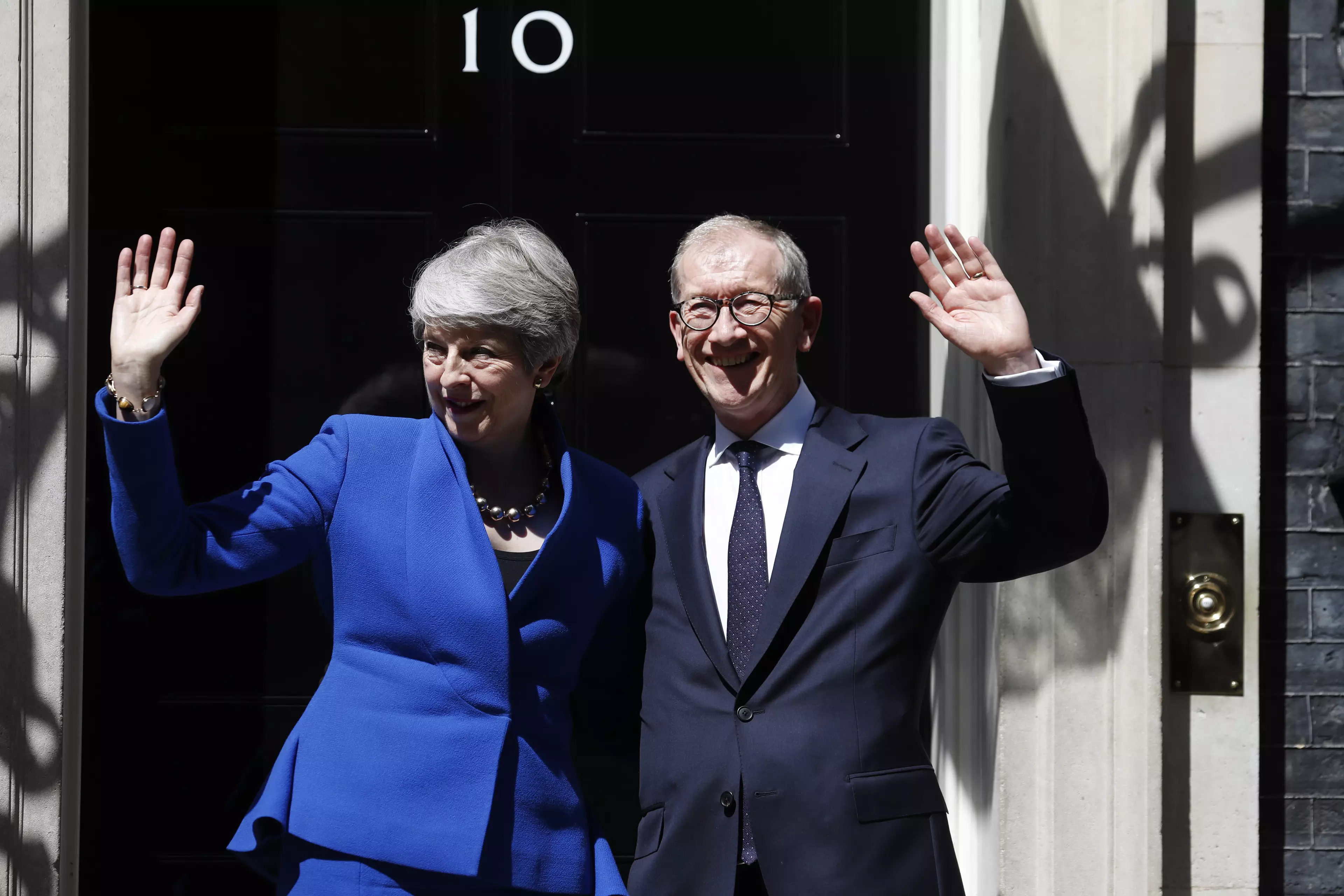 Theresa May and husband Philip leave Downing Street.