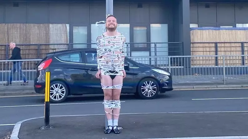Semi-Naked Groom Taped To Traffic Lights In Stag Do Prank
