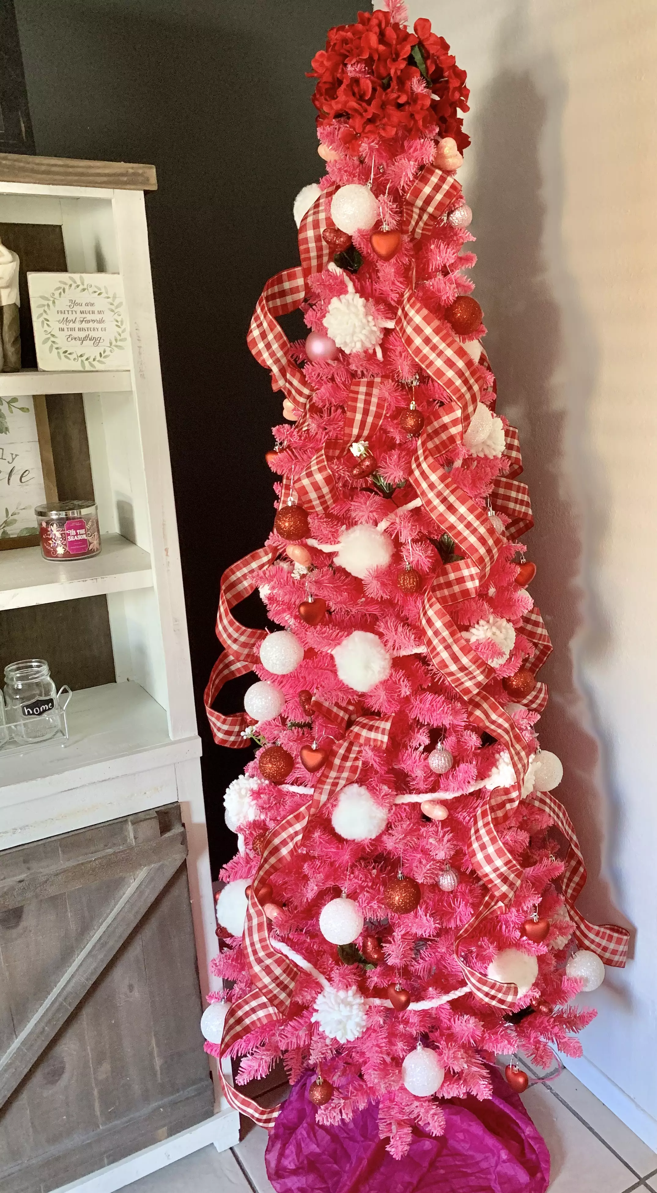 Karina's tree is Valentine's Day embodied thanks to its pink and red theme (