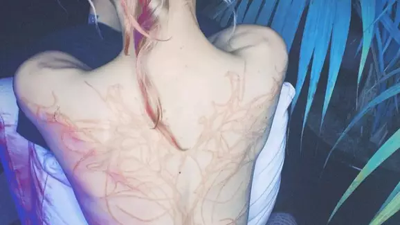 Elon Musk's Girlfriend Grimes Shows Off Huge New 'Alien Scars' Back Tattoo 