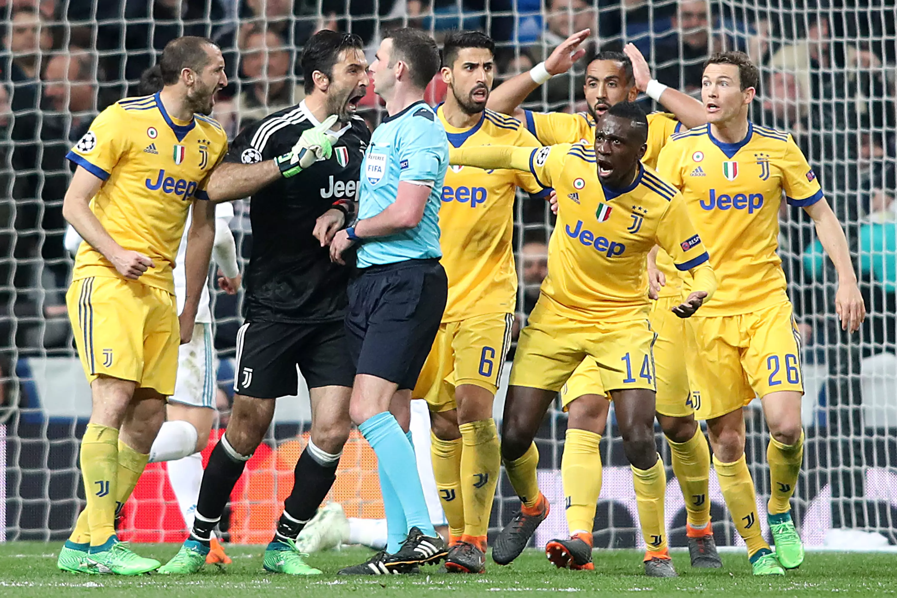 Buffon confronts Oliver. Image: PA