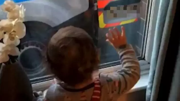 Toddler Innocently Waves As Man In Handcuffs Is Put Into Back Of Police Van