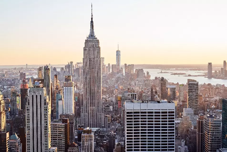 The Empire State Building has a total height of 0.4432km.