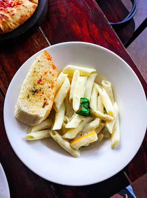 Pasta without a side of garlic bread is criminal in our opinion (