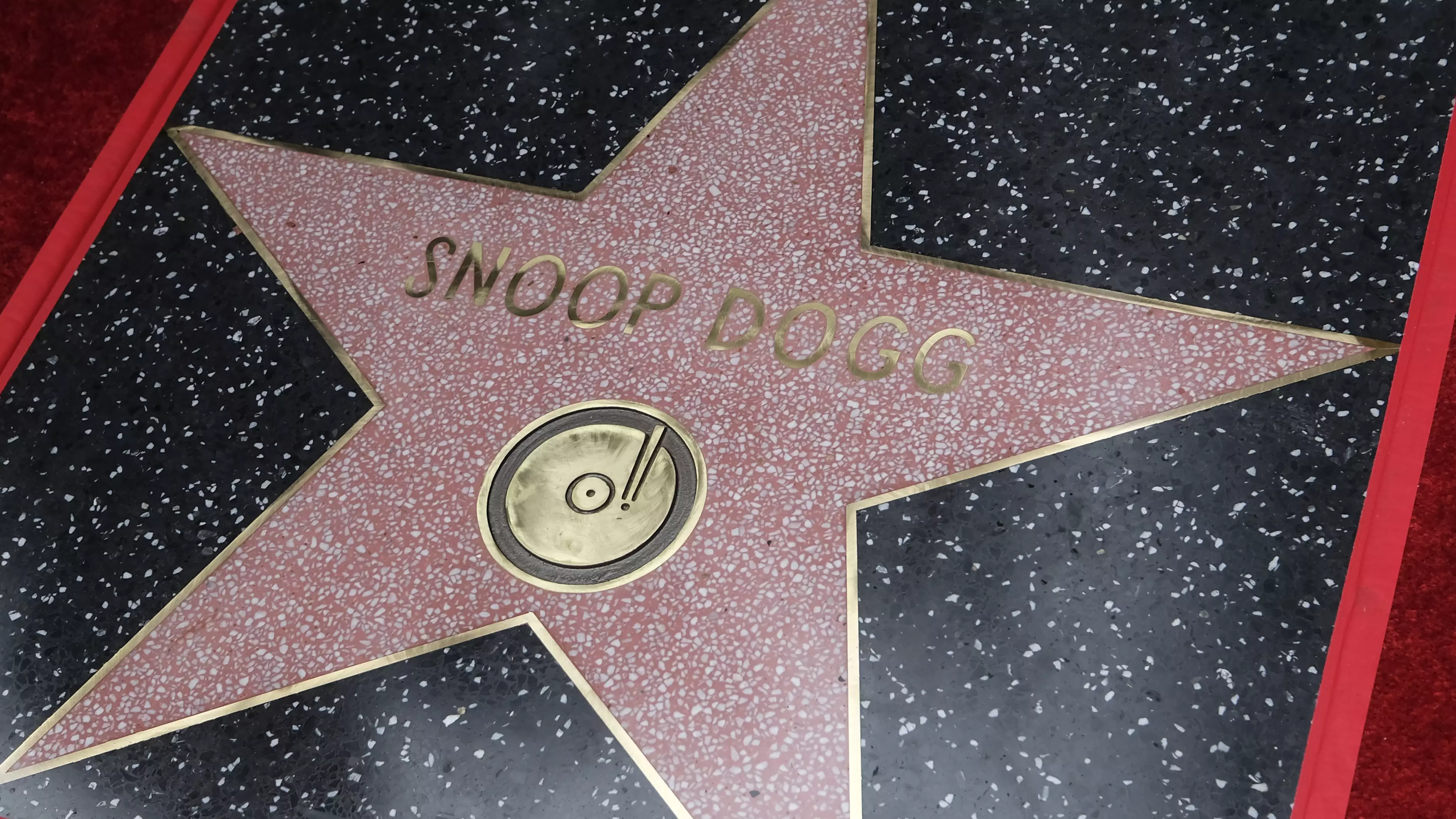 Snoop Dogg Unveils Walk Of Fame Star Like Only He Can