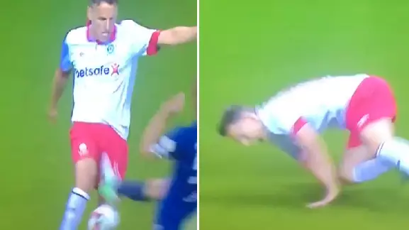 WATCH: Carles Puyol Absolutely Destroy Phil Neville With Brutal Tackle 