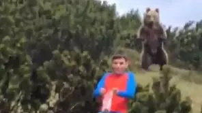 Boy's Incredible Reaction Shows Just What To Do When Being Stalked By A Bear