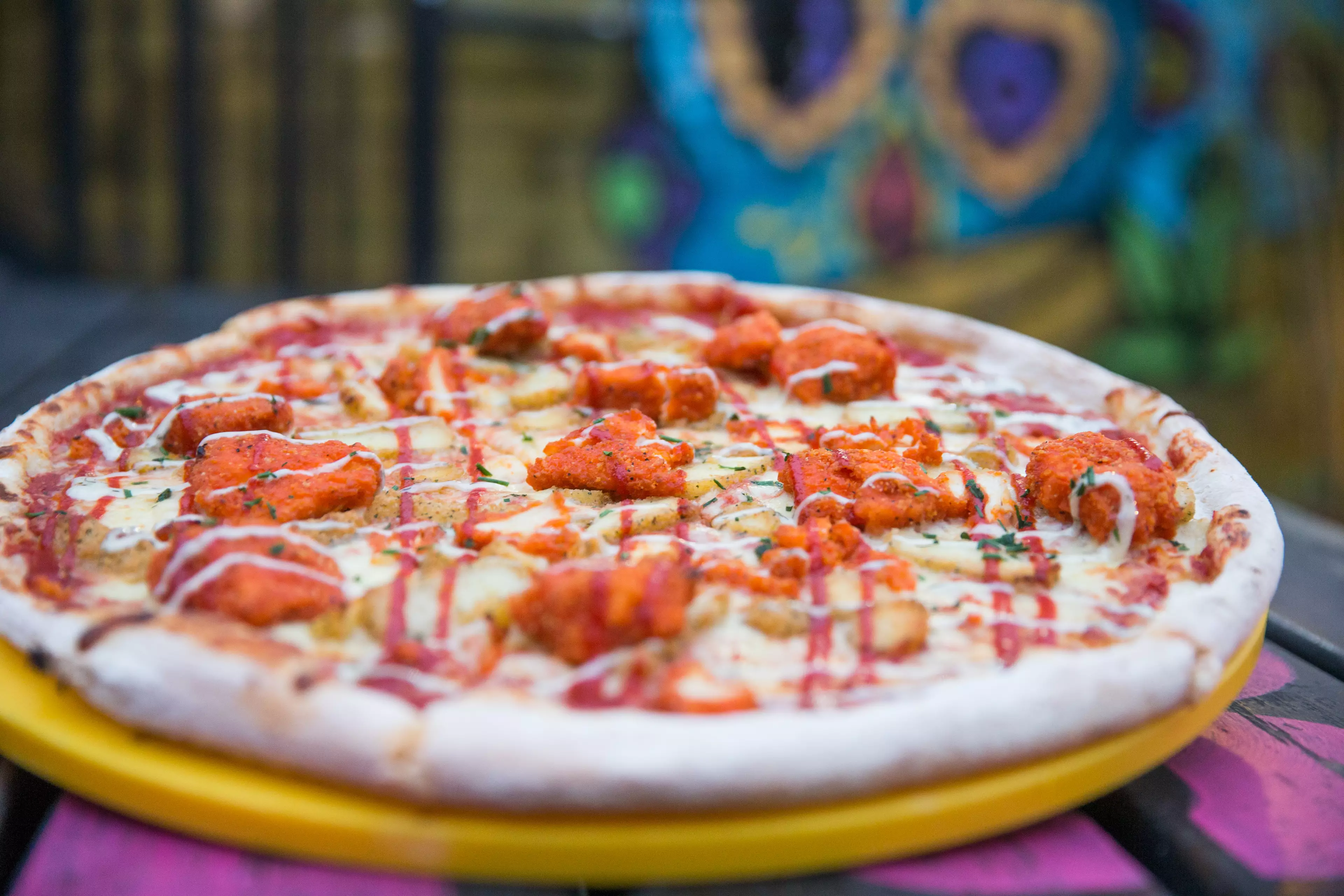 The pizza is drizzled with a sauce made from two of the world's hottest chilli varieties, Naga Viper and Carolina Reaper (