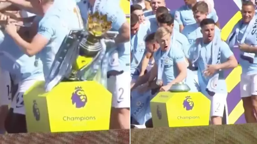 The Priceless Reaction When Manchester City Players Knock Over The Premier League Trophy 