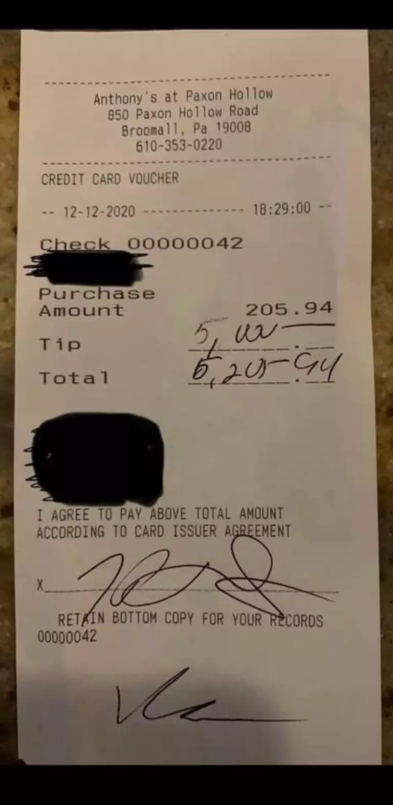 That is one generous tip. Or they're just extremely bad at maths.