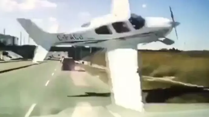 Dash Cam Footage Shows Plane Narrowly Avoiding Crashing Into Traffic