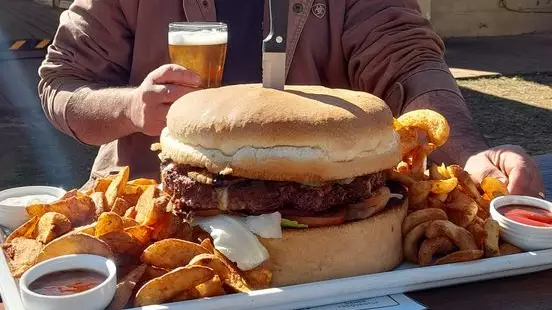 Aussie Pub Challenges People To Try And Finish Their Mammoth Burger