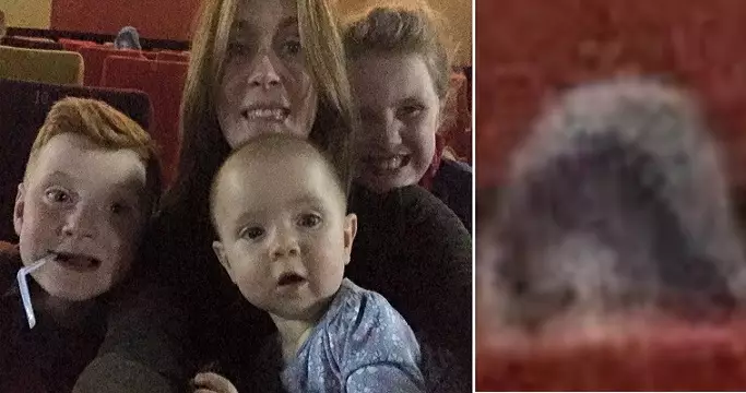 Ghost Appears In Background Of Family's Selfie At The Cinema