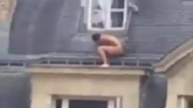 Nothing To See Here, Just A Naked Man Hiding On A Roof