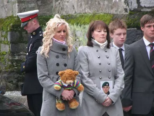 Marine Travis Mackin's family at his funeral service at St Andrew's Church, in Plymouth.