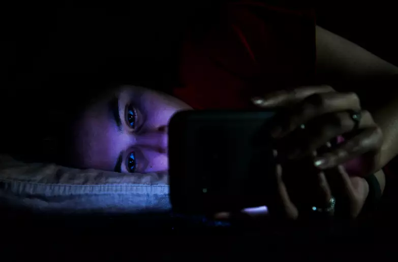 Exposure to blue light at night messes with your Circadian Rhythm aka your body clock.