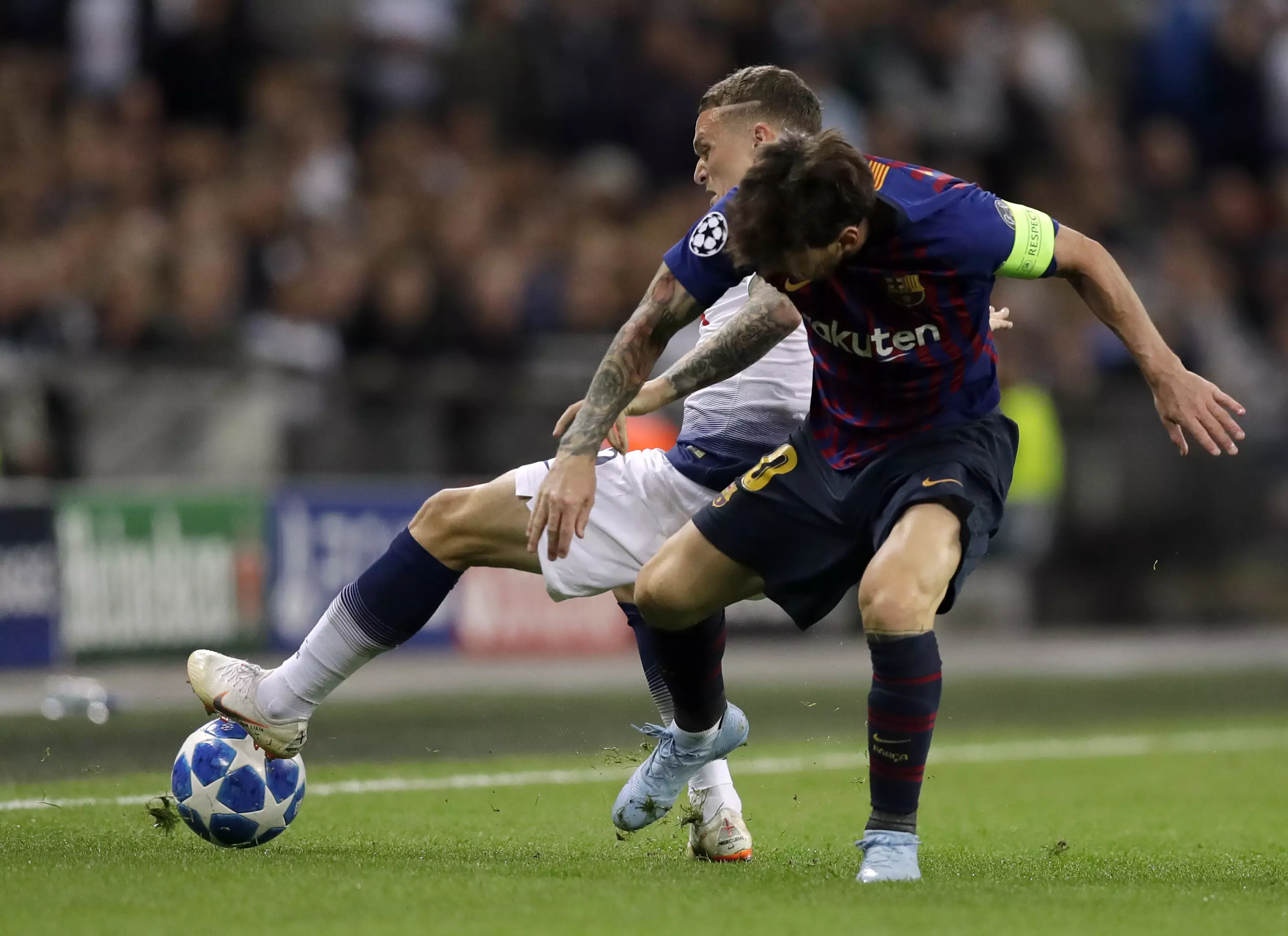 Messi and Trippier duel for the ball. Image: PA