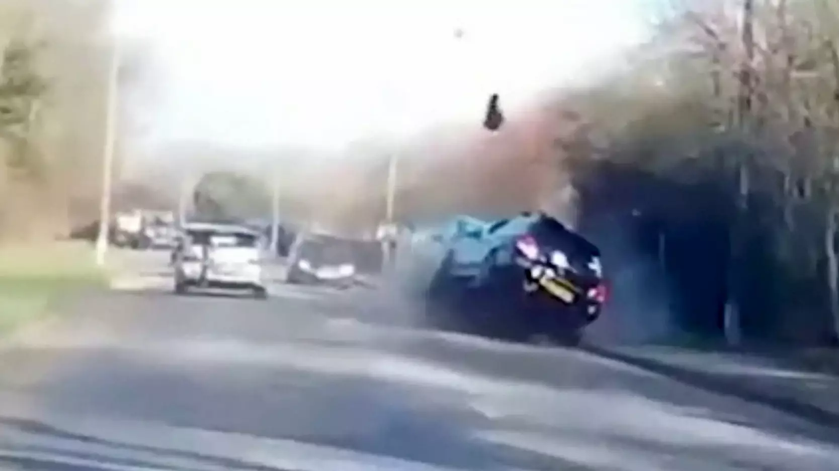 Speeding Driver Almost Flips Car In Head-On Smash 